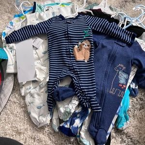 Lot of newborn and 0-3 sleepers and onesies